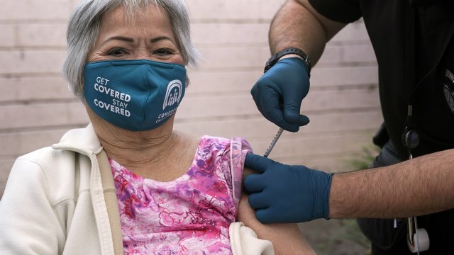 Hoa Pham gets her second dose of Pfizer's COVID-19 vaccine