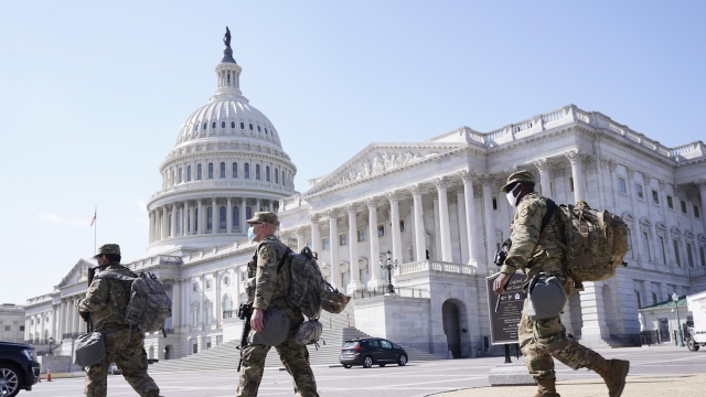 National Guard walk near the Capitol