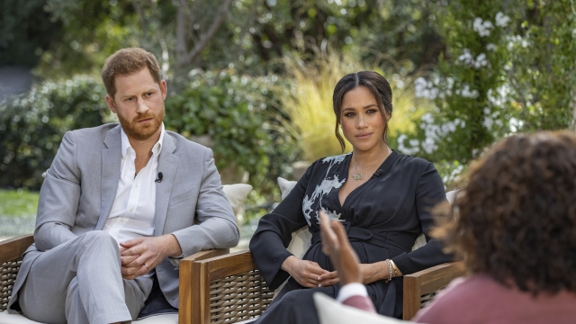 Prince Harry and Meghan, the Duchess of Sussex, speak with Oprah Winfrey
