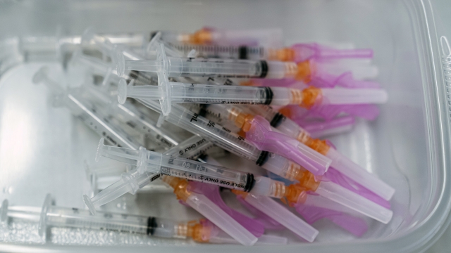 A batch of syringes filled with Moderna COVID-19 vaccines are ready for inoculations.