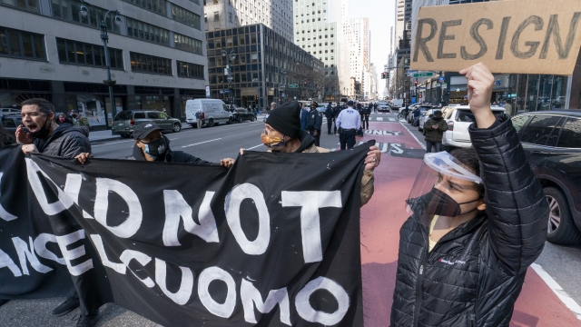 The activists were demanding Cuomo's immediate resignation