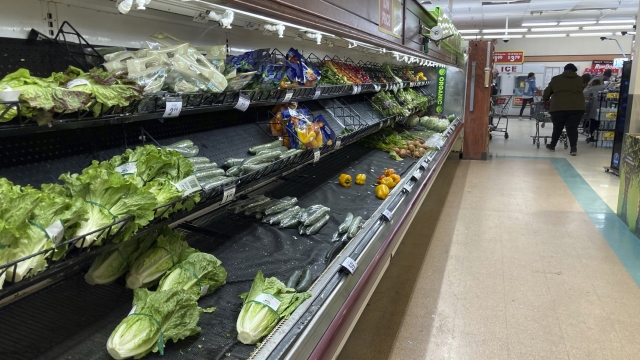 Inventory dwindles at a grocery store in Denver, Colorado as a winter storm approaches.