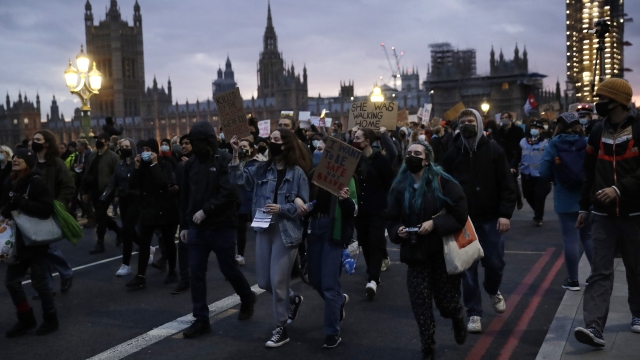 People march across Westminster bridge in England