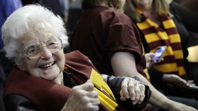 Sister Jean Dolores Schmidt sits with other Loyola-Chicago fans