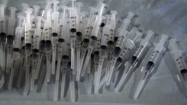 Syringes prepared with Pfizer's COVID-19 vaccine.