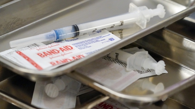 Syringes are filled with the Moderna COVID-19 vaccine at a pop up site in New York.