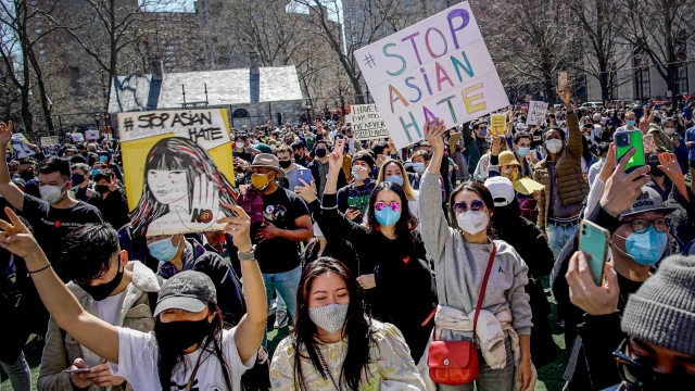 People at a rally against hate and violence against Asians living in the United States in New York.