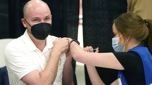 Utah Gov. Spencer Cox receives his first dose of the Pfizer vaccine