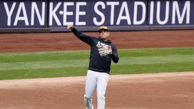 New York Yankees third baseman Gio Urshela (29) throws from his position during a team workout.