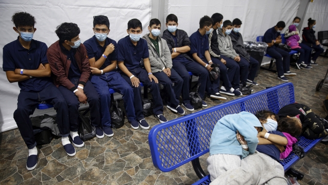 Young unaccompanied migrants wait at the secondary processing station inside the U.S. Customs and Border Protection facility.