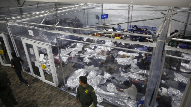 Minors lie inside a pod at the Donna Department of Homeland Security holding facility.