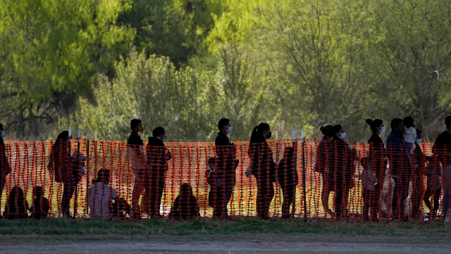 Migrants are seen in custody at a U.S. Customs and Border Protection processing area.