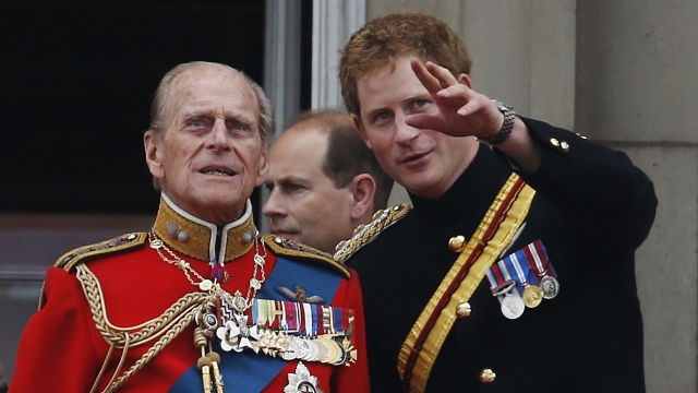Britain's Prince Harry (right) talks to his grandfather, Prince Philip (left)