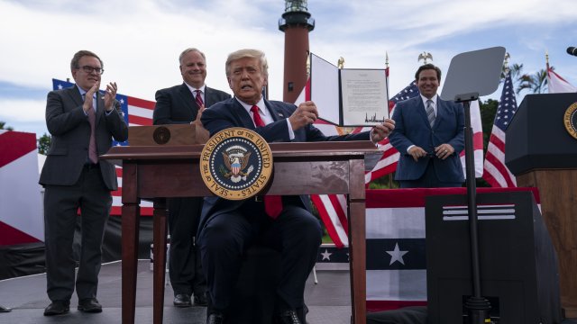President Trump signing a memorandum to protect Florida coastline from offshore drilling