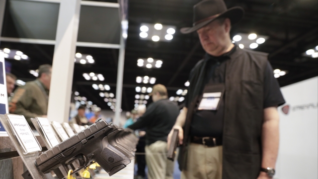 A gun enthusiast at a National Rifle Association Annual Meeting