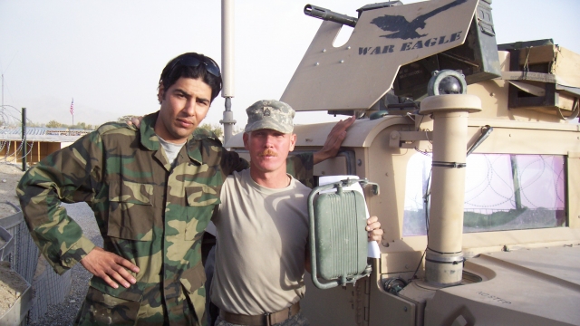 Afghan interpreter Janis Shinwari (left) and a U.S. solider in Afghanistan
