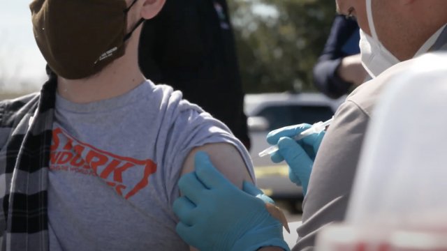 An individual gets vaccinated at La Familia's vaccine site in Hayward, California.