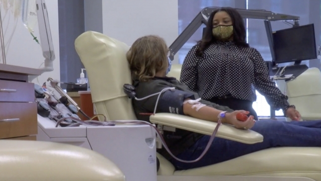 Woman donates blood