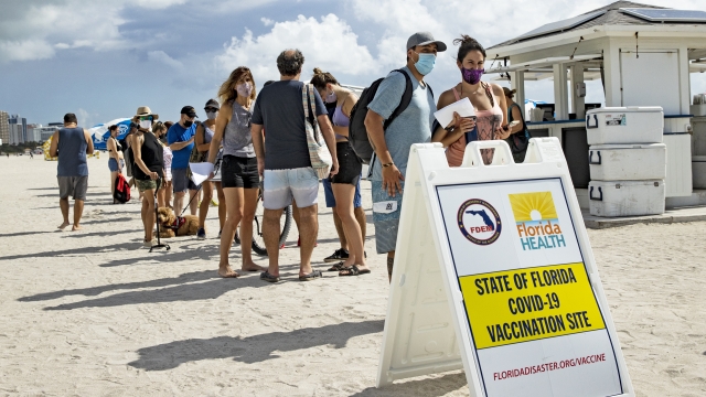People line up to receive a Johnson & Johnson vaccine at the one-time pop-up vaccination site in Florida.