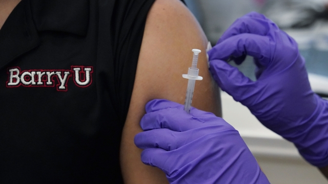 Person receives COVID vaccine shot