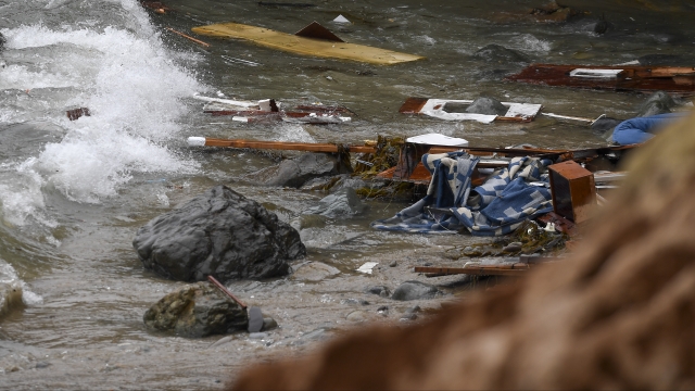 Wreckage and debris from a capsized boat washes ashore at Cabrillo National Monument near San Diego.