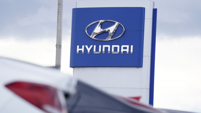 Hyundai company logo at a car dealership.