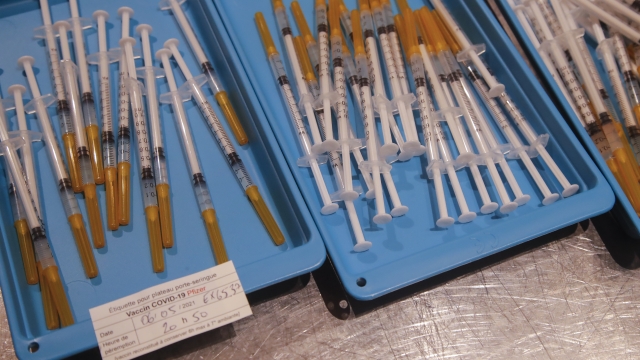 Syringes with the Pfizer vaccine against COVID-19 disease.