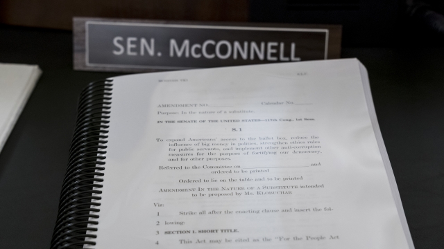 A book of amendments awaits Senate Minority Leader Mitch McConnell of Ky., at a Senate Rules Committee hearing at the Capitol