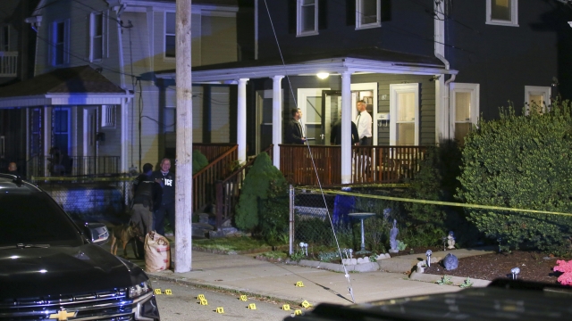 Providence Police investigate a shooting on Carolina Avenue, late Thursday, May 13, 2021, in Providence, R.I.