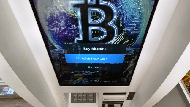 The Bitcoin logo appears on a cryptocurrency ATM.