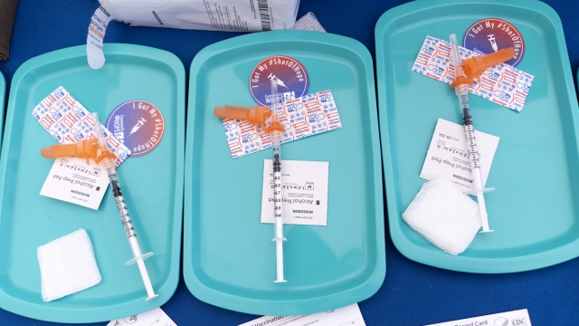 COVID-19 vaccine doses are prepared for members of the community 12 years and up.