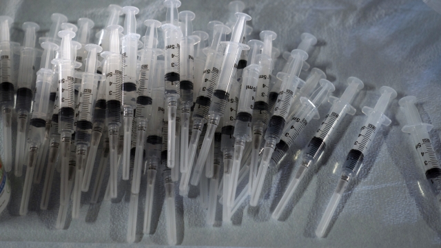 Syringes prepared with Pfizer's COVID-19 vaccine
