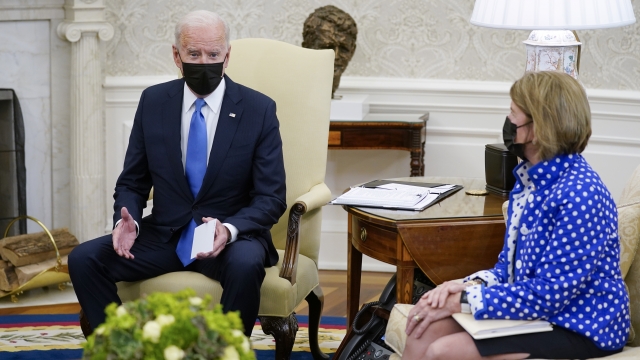 President Joe Biden speaks with West Virginia Senator Shelley Moore Capito.