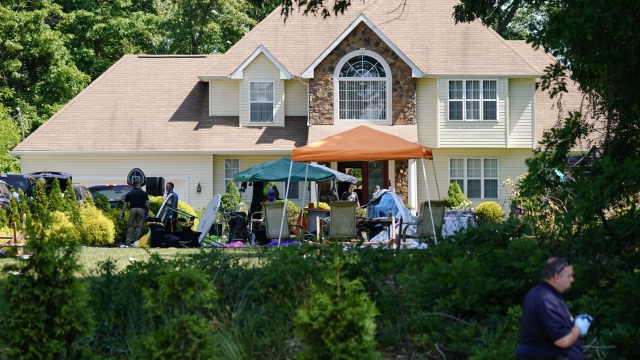 Investigators work the scene of a shooting in Fairfield Township, N.J.