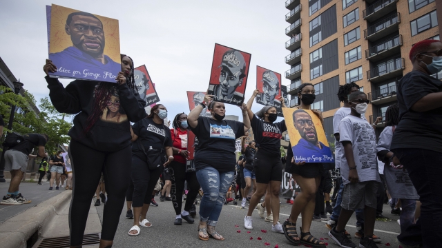 Family of Daunte Wright in a march commemorating the one year anniversary of George Floyd's death
