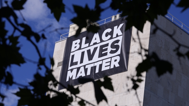 A 'Black Lives Matter' banner marking the one-year anniversary of the killing of George Floyd