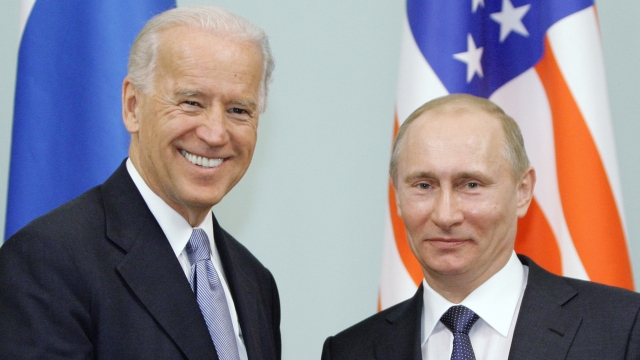 In 2011, then Vice President Joe Biden, left, shakes hands with Russian Prime Minister Vladimir Putin in Moscow, Russia