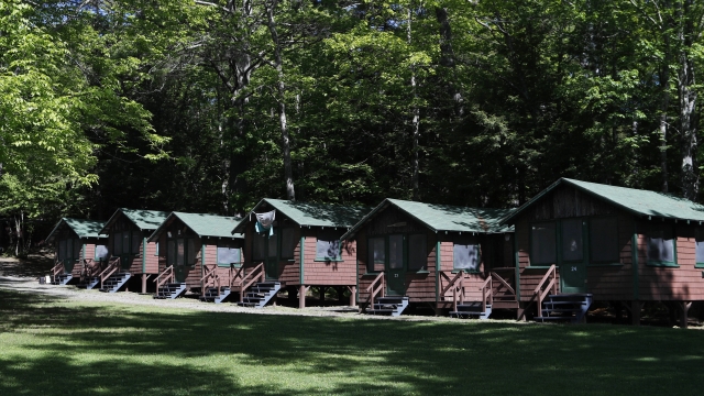 A row of cabins at a summer camp in Fayette, Maine
