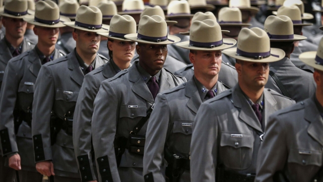 New state troopers stand during the 201st graduation ceremony of the New York State Police.
