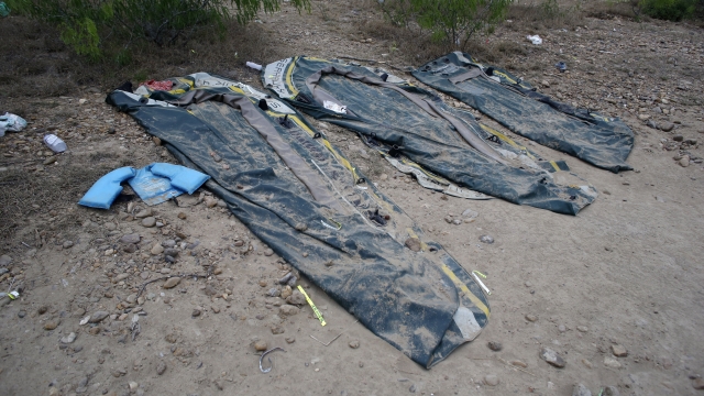 Discarded inflatable rafts lie on the banks of the Rio Grande river after they were used to smuggle migrants onto U.S. soil.