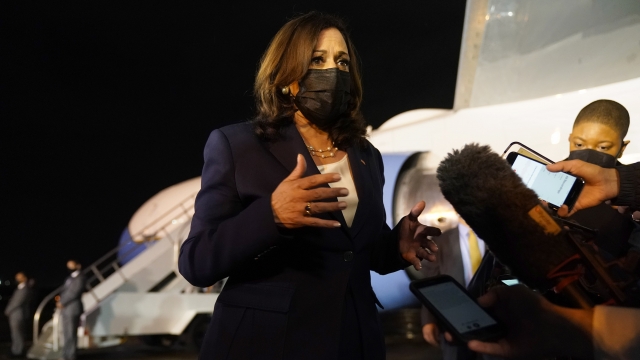 Vice President Kamala Harris talks to the press gathered under the wing of Air Force Two as she prepares to depart to Mexico.