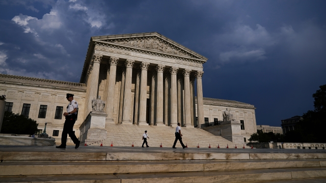 The Supreme Court is seen under threatening skies following a storm in Washington.