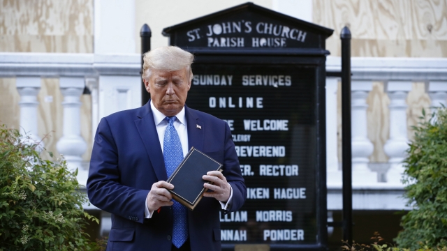 President Donald Trump holds a Bible during a visit outside St. John's Church across Lafayette Park from the White House