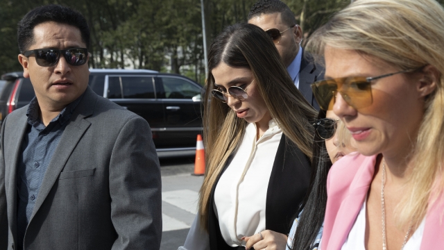 Emma Coronel Aispuro, center, wife of Mexican drug lord Joaquin "El Chapo" Guzman, arrives at federal court in 2019.