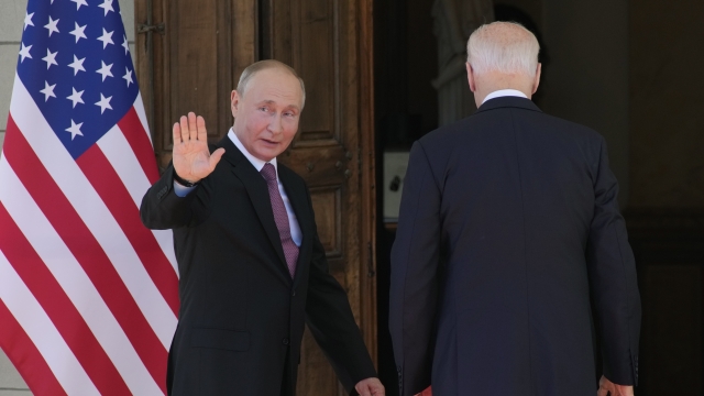 Russian President Vladimir Putin, left, and U.S President Joe Biden enter the 'Villa la Grange' in Geneva