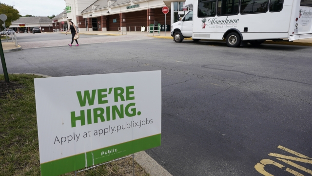 A We're Hiring sign at a Publix supermarket in Richmond, Virginia