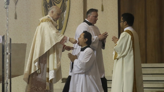 San Francisco Archbishop Salvatore Cordileone celebrates Communion during Easter Mass.