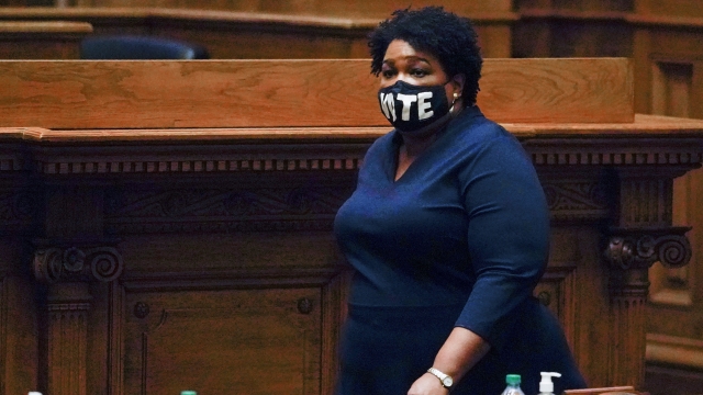 Democrat Stacey Abrams walks on Senate floor