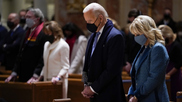 Then President-Elect Biden and his wife, Jill Biden, attend mass