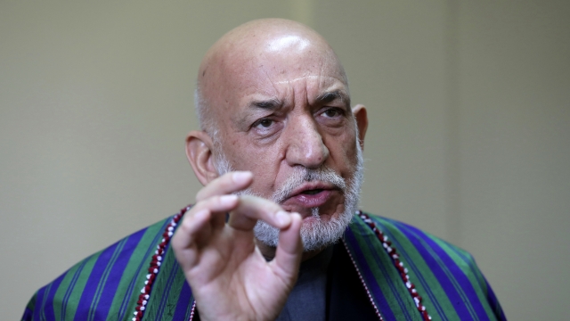 Former Afghan President Hamid Karzai speaks during an interview to the Associated Press in Kabul, Afghanistan.